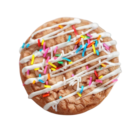 Confetti cookie with rainbow sprinkles, white chocolate chips, and white chocolate drizzle