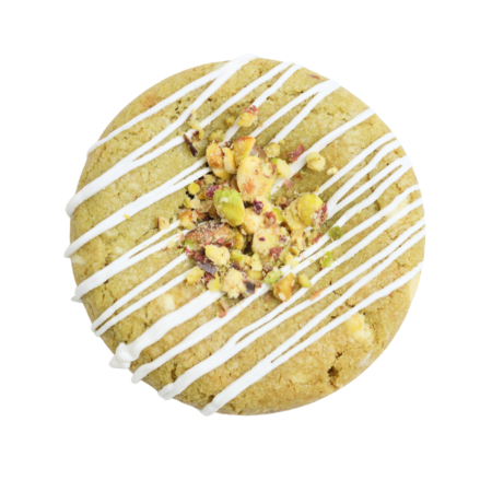 Green matcha cookie with white chocolate pieces.