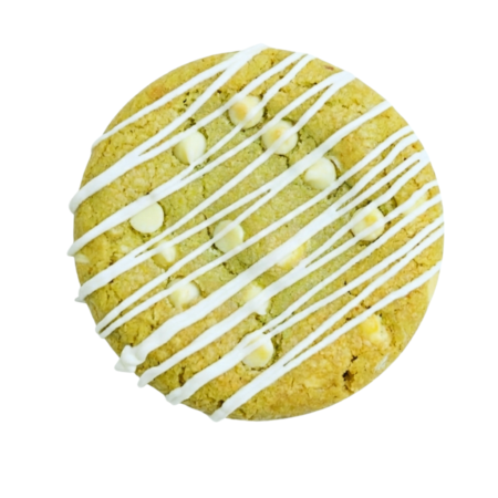 Green matcha cookie with white chocolate pieces.