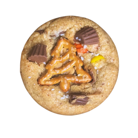 Peanut butter cookie with Reese’s cups and pretzel topping.